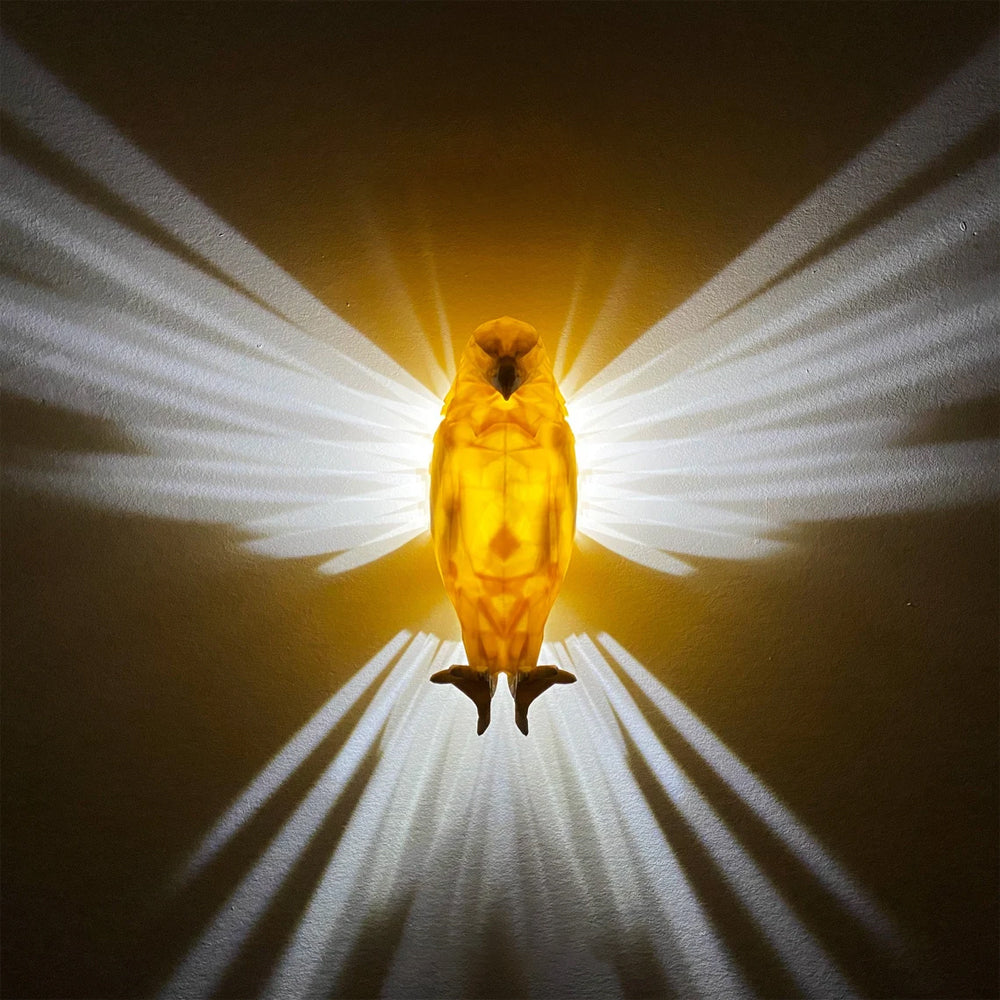 Lichtkunst-Wandlampe in Vogelform
