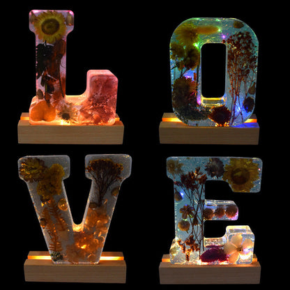 Bunte LED Buchstaben mit Blumen