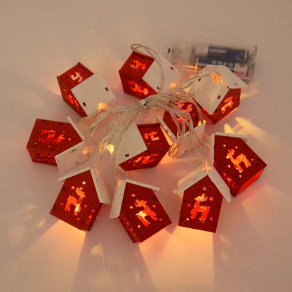 Weihnachtshäuser aus Holz mit stimmungsvollen LEDs für Dekoration