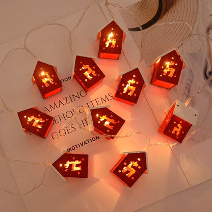 Weihnachtshäuser aus Holz mit stimmungsvollen LEDs für Dekoration