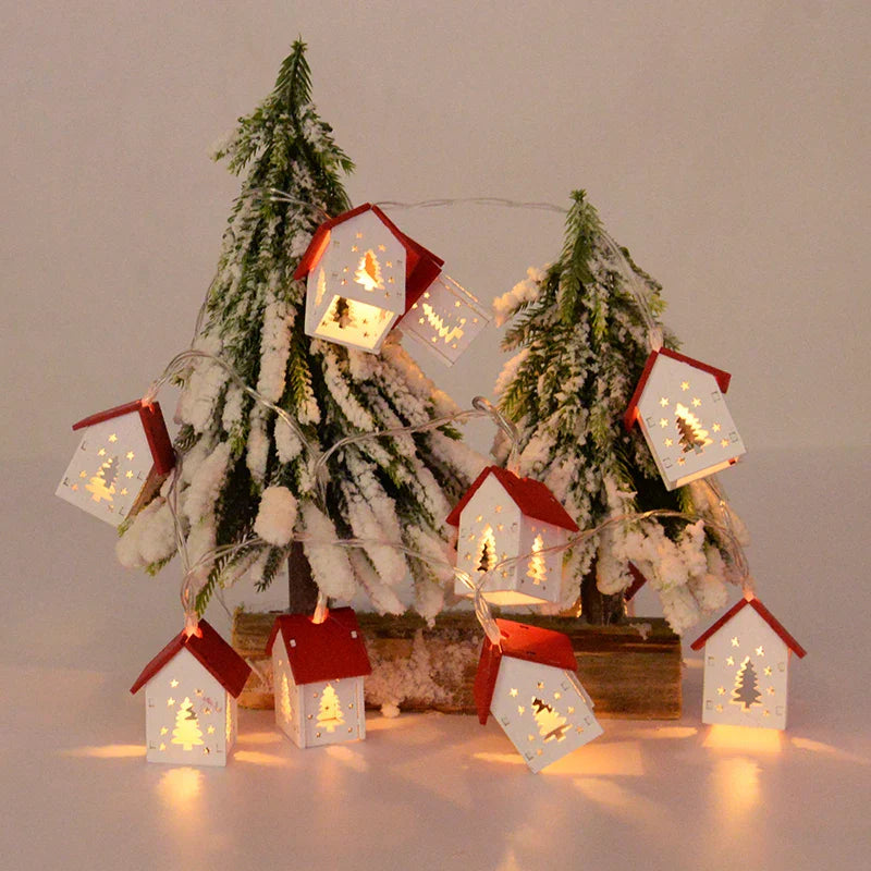 Deko-Holzhäuser mit LED-Lichtern für festliche Weihnachtsatmosphäre