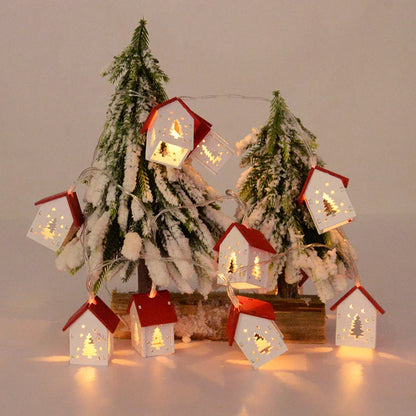 Weihnachtshäuser aus Holz mit stimmungsvollen LEDs für Dekoration