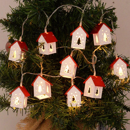Deko-Holzhäuser mit LED-Lichtern für festliche Weihnachtsatmosphäre