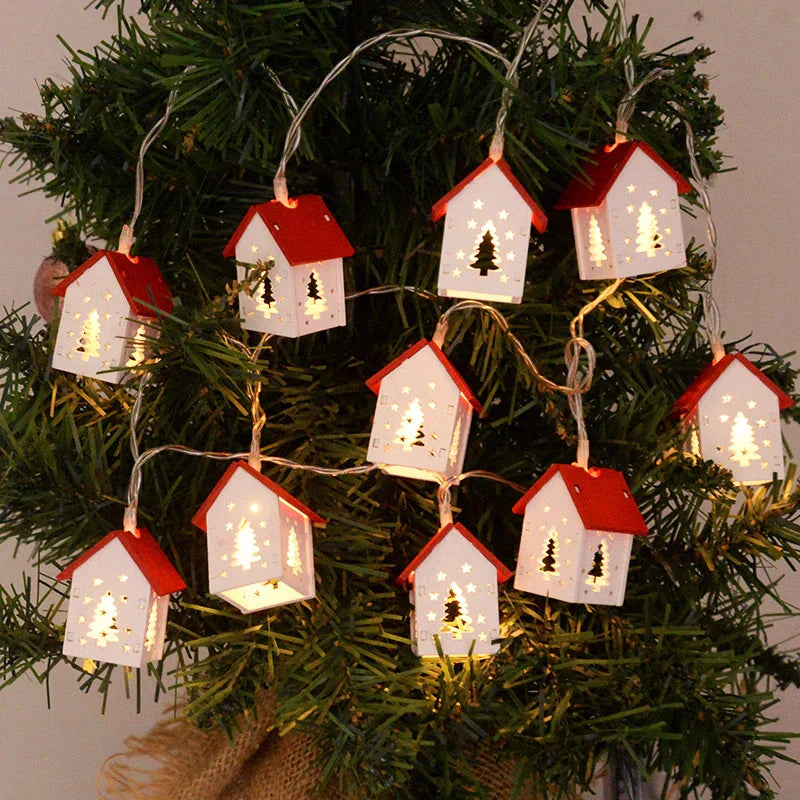 Weihnachtshäuser aus Holz mit stimmungsvollen LEDs für Dekoration