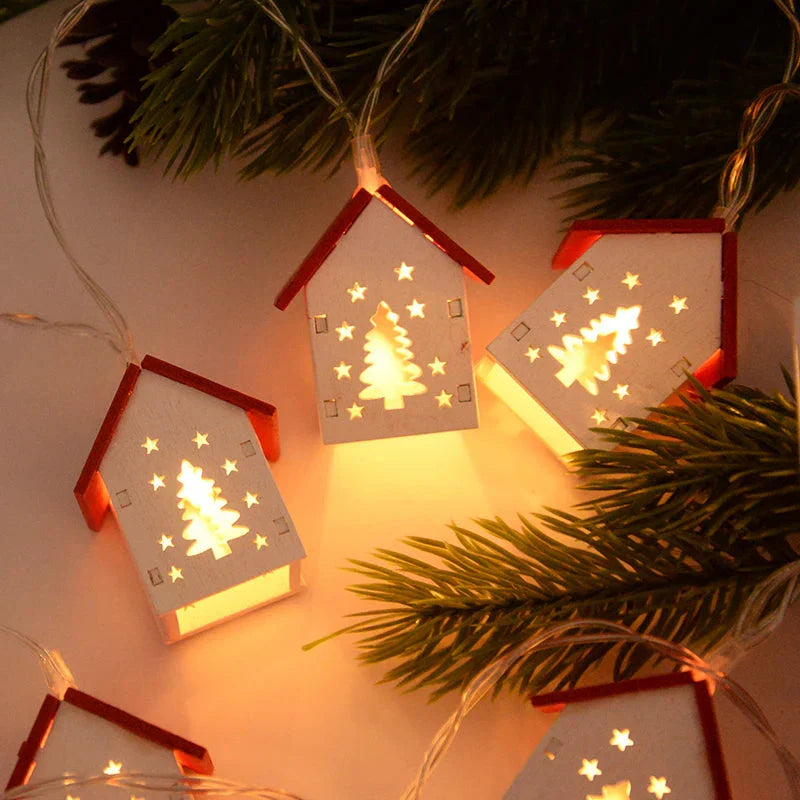 Weihnachtshäuser aus Holz mit stimmungsvollen LEDs für Dekoration