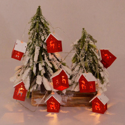 Deko-Holzhäuser mit LED-Lichtern für festliche Weihnachtsatmosphäre