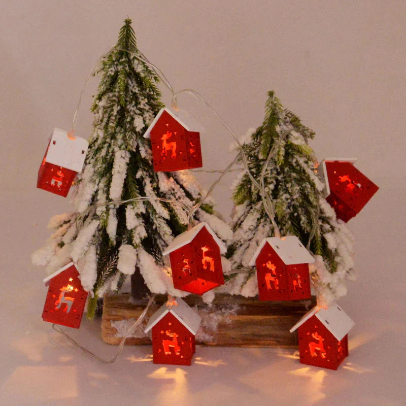 Weihnachtshäuser aus Holz mit stimmungsvollen LEDs für Dekoration
