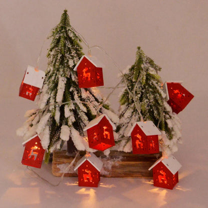 Weihnachtshäuser aus Holz mit stimmungsvollen LEDs für Dekoration