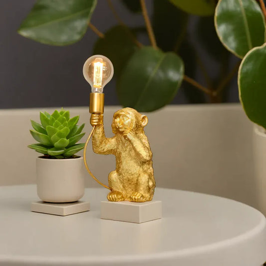 Goldene Affen Tischlampe mit Blumentopf